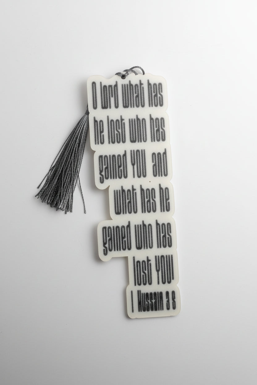 Decorative bookmark with tassel and motivational quote on a white background