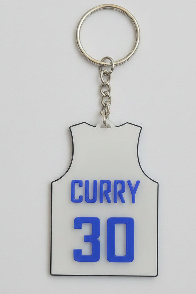 Custom basketball jersey keychain in biodegradable PLA — personalized with team name, player name and number by Aurelis Design Studio
