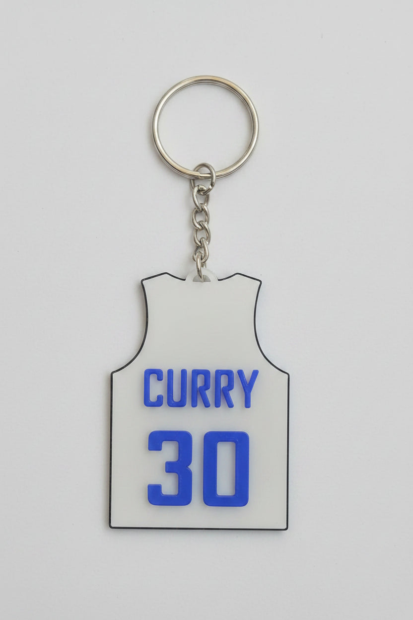 Custom basketball jersey keychain in biodegradable PLA — personalized with team name, player name and number by Aurelis Design Studio