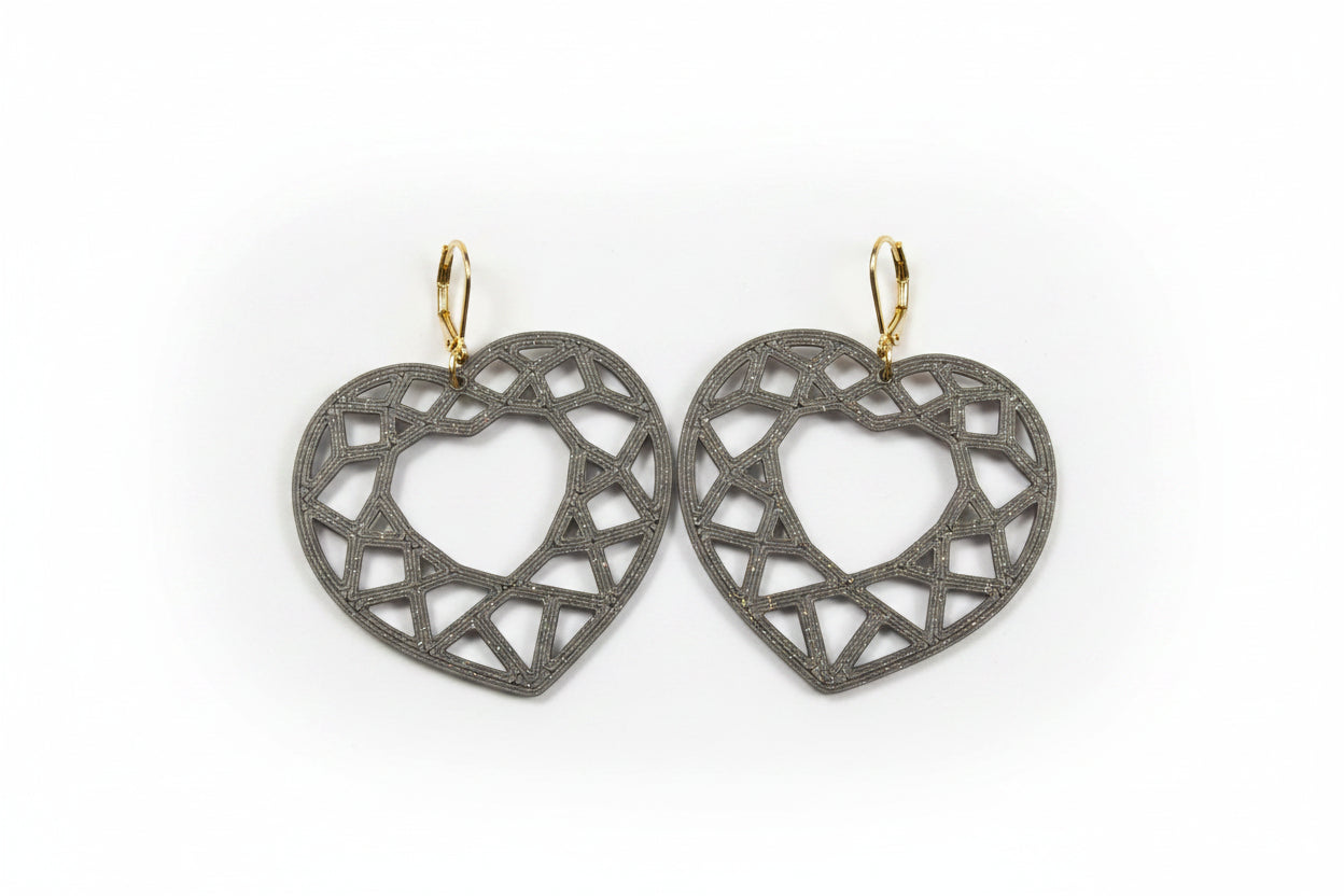 Close-up of Geometric Heart Earrings showing PLA material and geometric detail in bronze color by Aurelis Design Studio