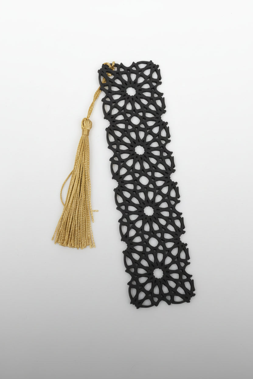 Black lace bookmark with a gold tassel 