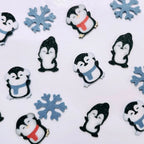 Custom 3D printed piece by Aurelis Design Studio of penguins and snowflakes on a white background