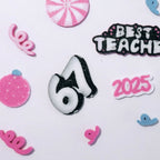 Custom 3D printed piece by Aurelis Design Studio of 67, 2025, best teacher, confetti, peppermint candy, ornament on a white background
