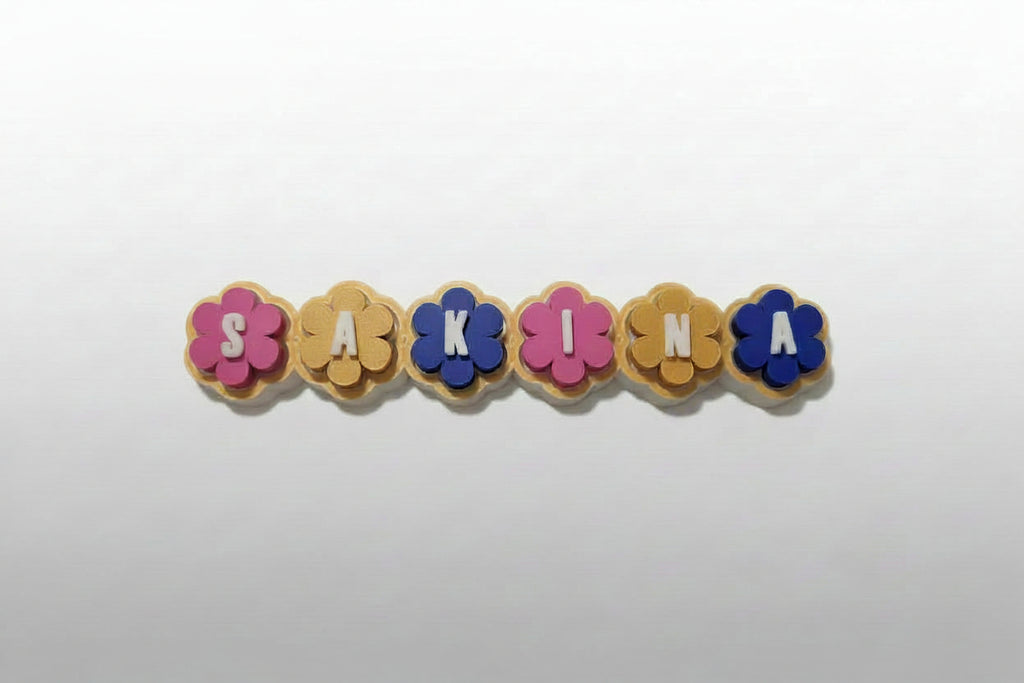 Candy-coloured personalized flower clicker in biodegradable PLA – custom name fidget toy
