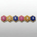 Candy-coloured personalized flower clicker in biodegradable PLA – custom name fidget toy
