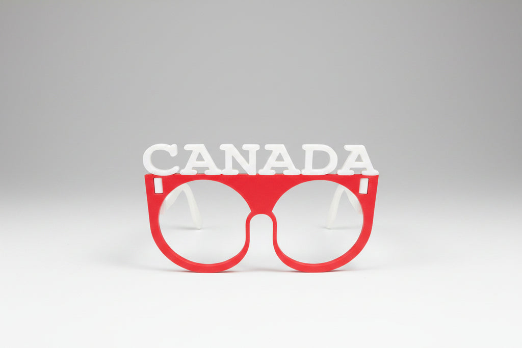Red sunglasses with 'Canada' text on a gray background
