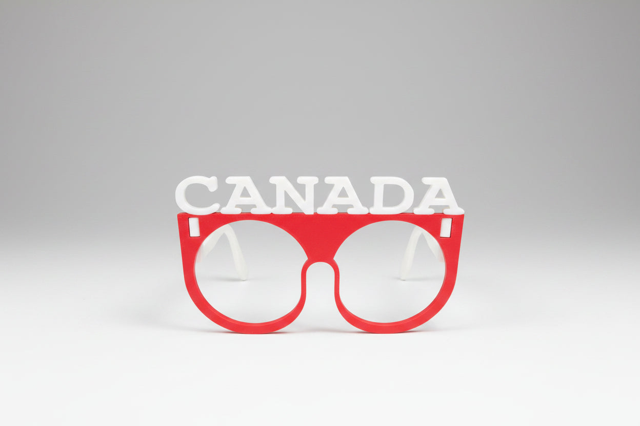Red sunglasses with 'Canada' text on a gray background